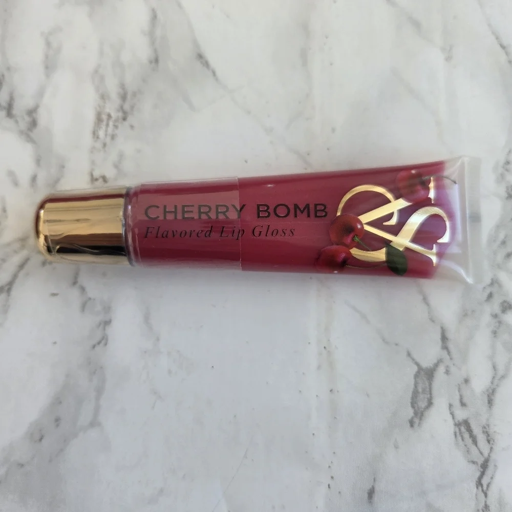 1 Victoria's Secret Lip Gloss  Flavored Favorities New